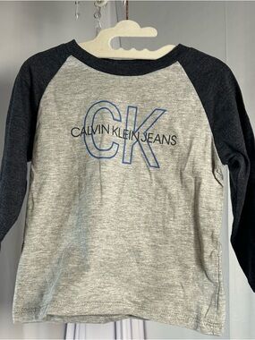 Calvin Klein Jeans Kids Grey Tee with Black Raglan Sleeves and Blue CK Logo